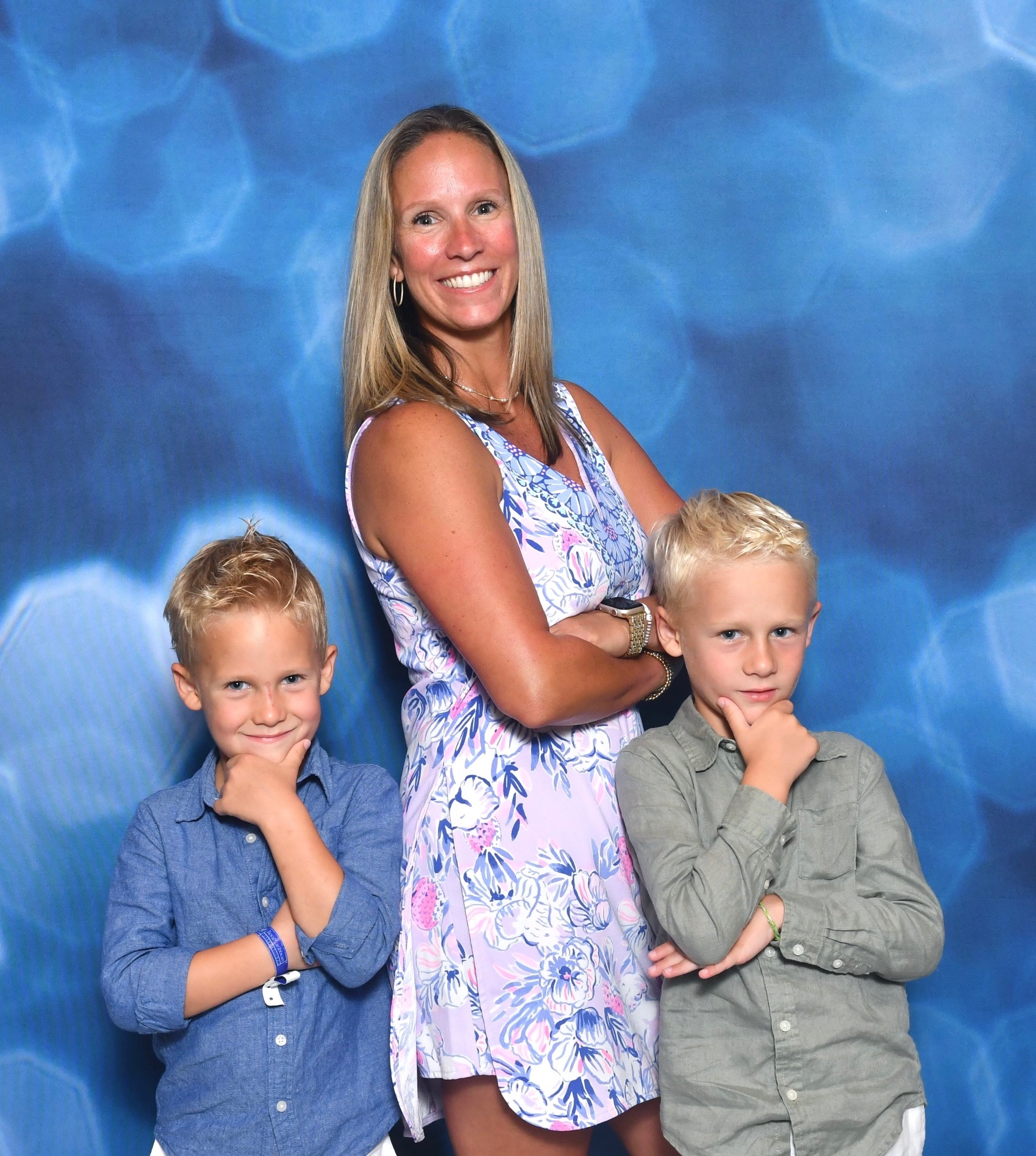 Crystal Snow, founder and owner of Snow & Sons Roofing, with her sons