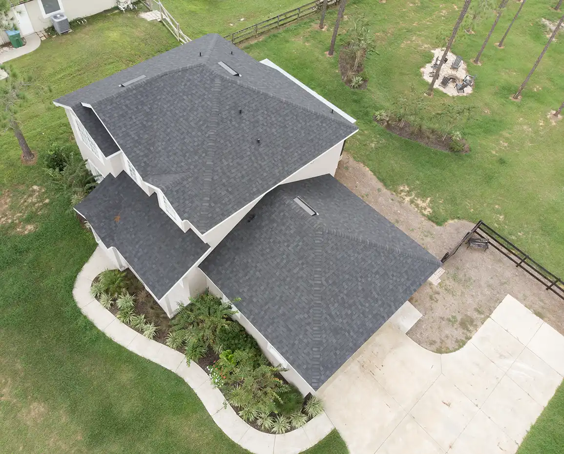 Aerial view of new shingle roof installation on a Central Florida home by Snow & Sons Roofing